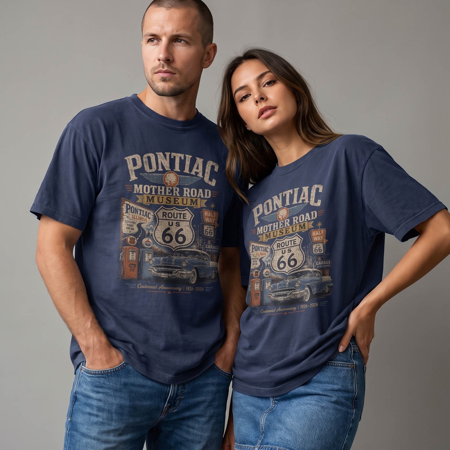 Unisex Pontiac Illinois Route 66 graphic tee featuring Mother Road Museum text, Route 66 shield, vintage gas pumps, classic car artwork, and 1926–2026 centennial text.