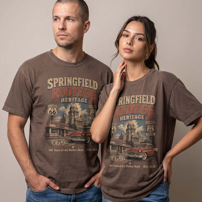 Unisex Springfield Illinois Route 66 graphic tee featuring historic architecture, Illinois Route 66 shield, roadside diner, classic car, and 1926–2026 Mother Road anniversary text.