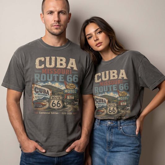 Unisex Cuba Missouri Route 66 graphic tee featuring vintage motel signs, Route 66 shield, classic car artwork, roadside scenery, and 1926–2026 centennial text.