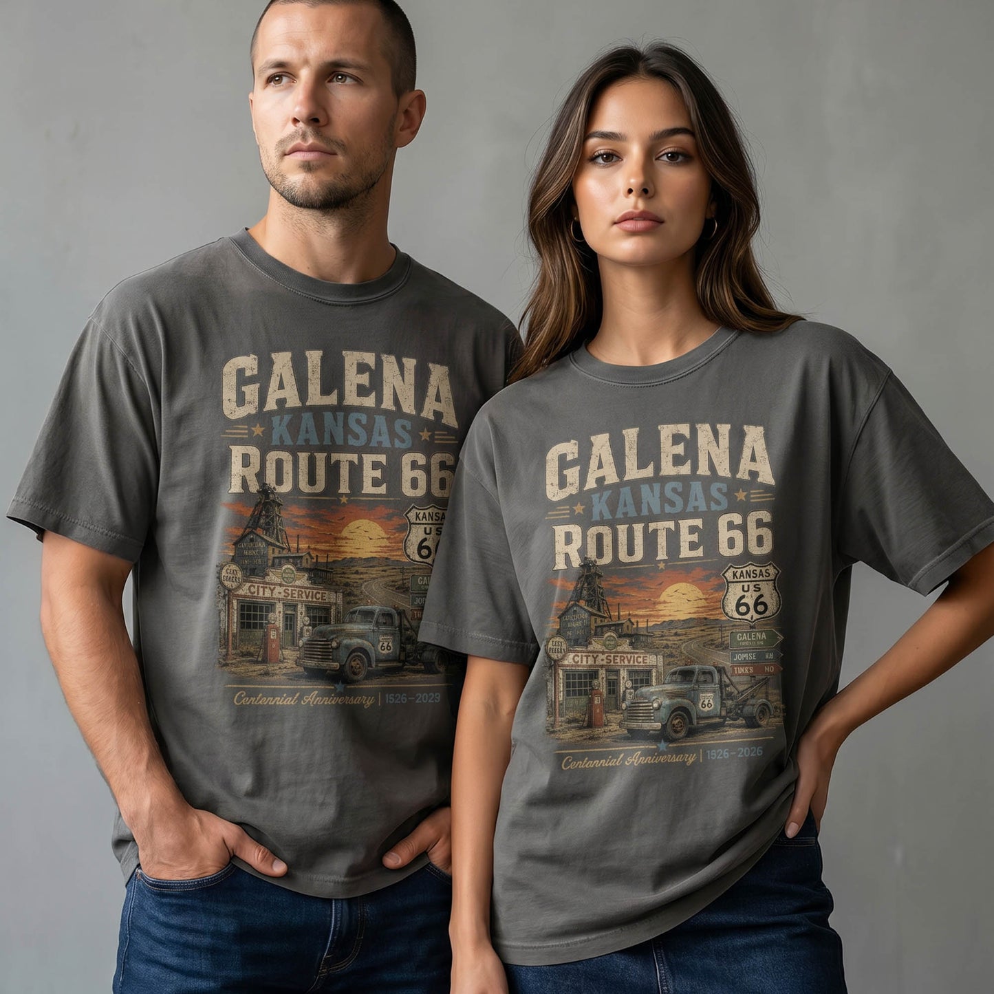 Unisex Galena Kansas Route 66 graphic tee featuring vintage service station artwork, Route 66 shield, classic pickup truck, sunset highway scenery, and 1926–2026 centennial text.