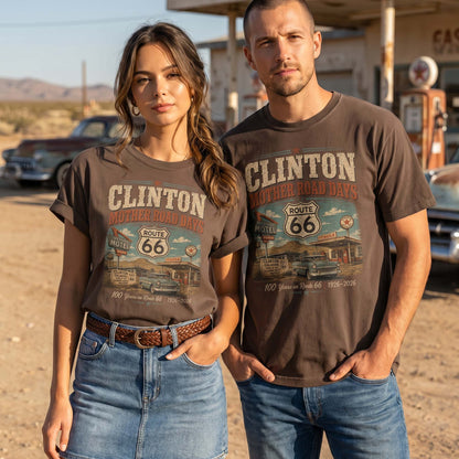 Unisex Clinton Oklahoma Route 66 graphic tee featuring Mother Road Days text, motel signage, Route 66 shield, classic car artwork, and 1926–2026 anniversary details.