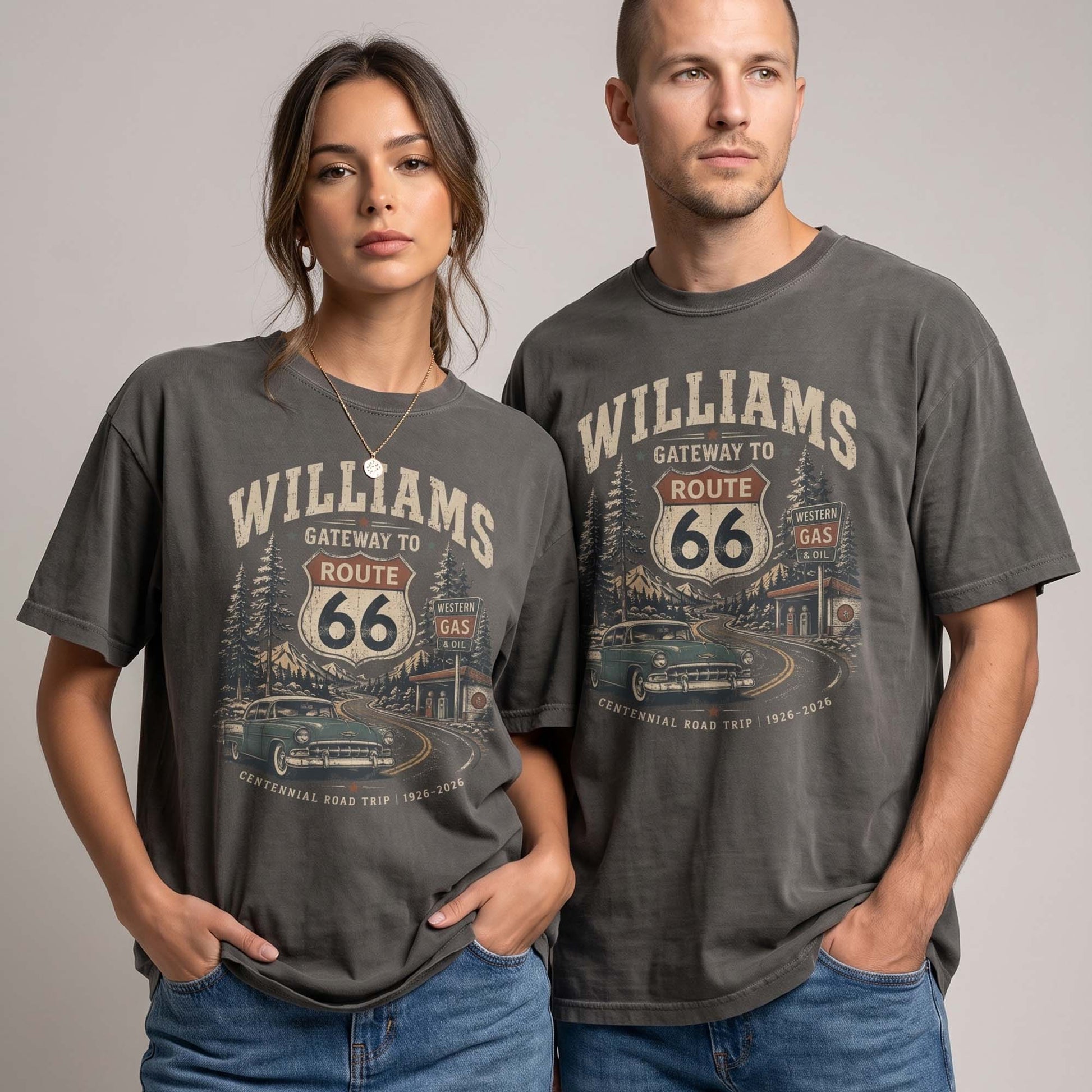 Unisex Williams Arizona Route 66 graphic tee featuring Gateway to Route 66 text, pine trees, mountain road scenery, vintage gas station, classic car, and 1926–2026 centennial details.
