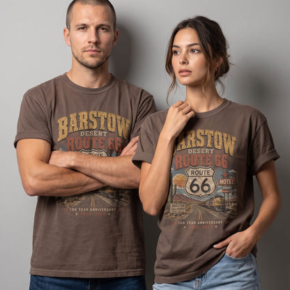 Unisex Barstow California Route 66 graphic tee featuring desert highway artwork, Route 66 shield, cactus details, vintage motel sign, roadside scenery, and 1926–2026 anniversary text.