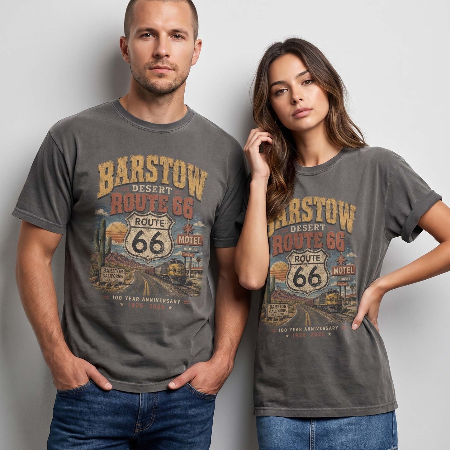 Unisex Barstow California Route 66 graphic tee featuring desert highway artwork, Route 66 shield, cactus details, vintage motel sign, roadside scenery, and 1926–2026 anniversary text.