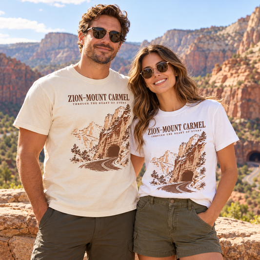 Couple wearing the Zion–Mount Carmel Tunnel graphic T-shirt in a red-rock landscape
