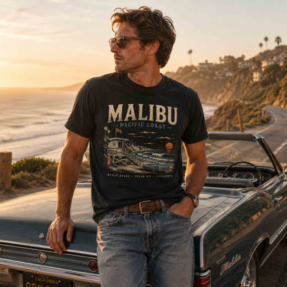 Men's Malibu Pacific Coast graphic t-shirt in Black beside a vintage convertible on the California coast
