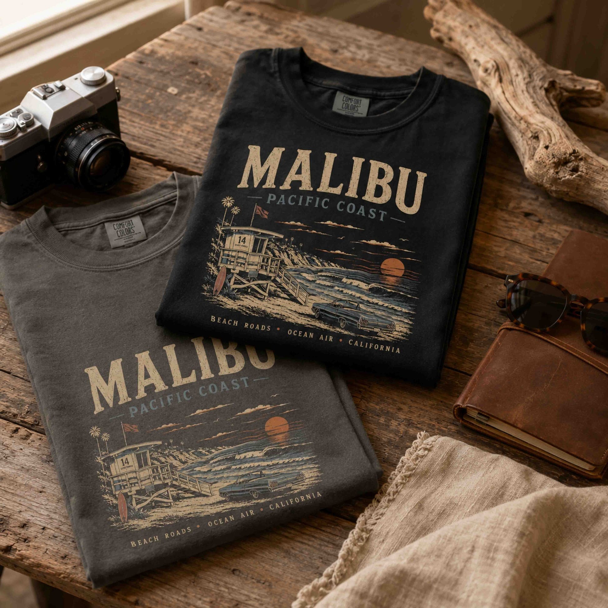 Folded Malibu Pacific Coast graphic t-shirts in Black and Pepper