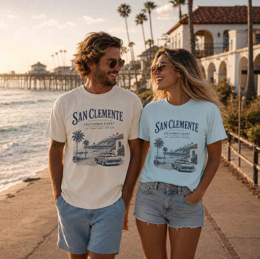 Couple wearing San Clemente California Coast graphic t-shirts by Being is Good