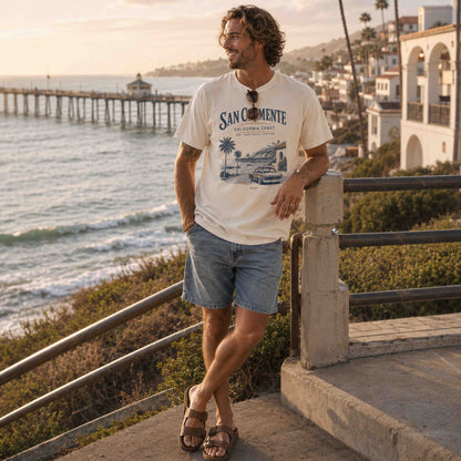 Man wearing Ivory San Clemente California Coast graphic t-shirt