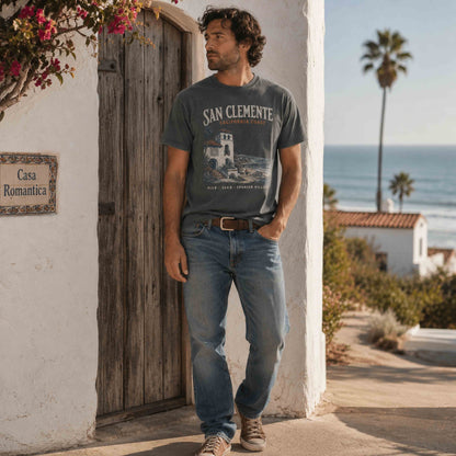 San Clemente California Coast graphic t-shirt in Pepper on a man near Casa Romantica and the Pacific Ocean